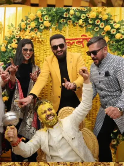 The groom and his friends celebrating wildly during the Haldi ceremony. We capture the energy and excitement of these moments.