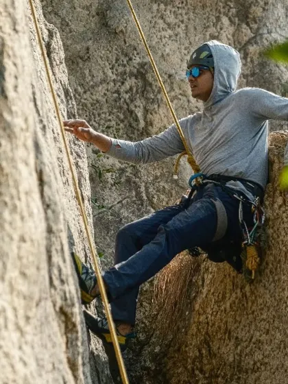 Meet Kartik, a software developer and all around outdoorsman. Here he is rappelling, showcasing the technical skills that are a core part of safe climbing.