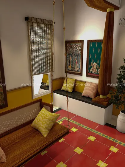 This cozy nook, complete with a traditional swing and built-in seating, is perfect for relaxing. The space is adorned with traditional Indian art, creating a culturally rich atmosphere.