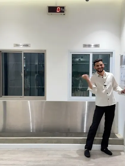 At the Tostem experience center, I'm demonstrating the water and air pressure test for their windows. This shows how well their products are sealed against rain and wind, a critical feature for homes in India, especially during monsoon season. This is the kind of quality testing that ensures long-term performance and peace of mind.