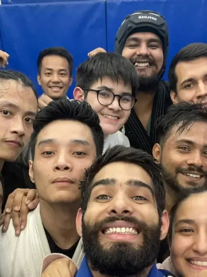 A close-up group selfie showing the intensity and joy of our training community.