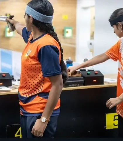 Teamwork and individual focus go hand in hand. Two of our female pistol shooters practice side-by-side, pushing each other to improve with every shot.