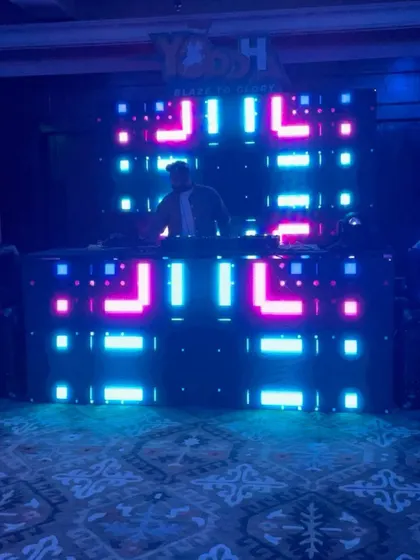 My VDJ setup against a stunning LED backdrop for a wedding event in Jodhpur. I bring a complete audio-visual production to make your destination wedding truly spectacular.