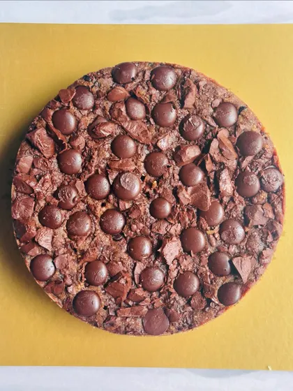For a healthier indulgence, I created this refined sugar-free and gluten-free tea cake. It's made with dark coverture chocolate and fresh strawberry puree for a rich, guilt-free treat.