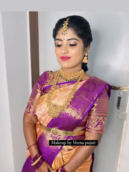 The beautiful Sahana Gowda at her baby’s naming ceremony. Her makeup is soft and pretty, with a focus on rosy tones.
