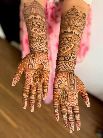 Another view of the grand bridal design with peacocks and traditional elements.