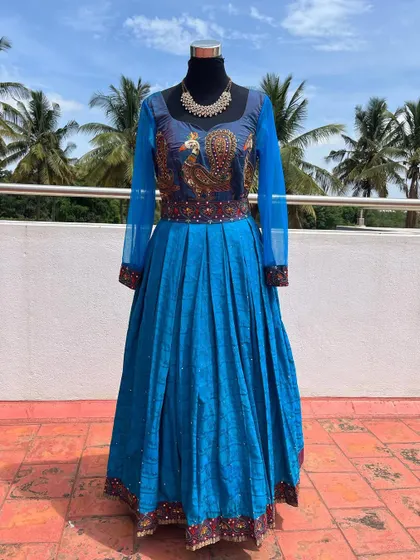 The full view of the stunning blue peacock gown.