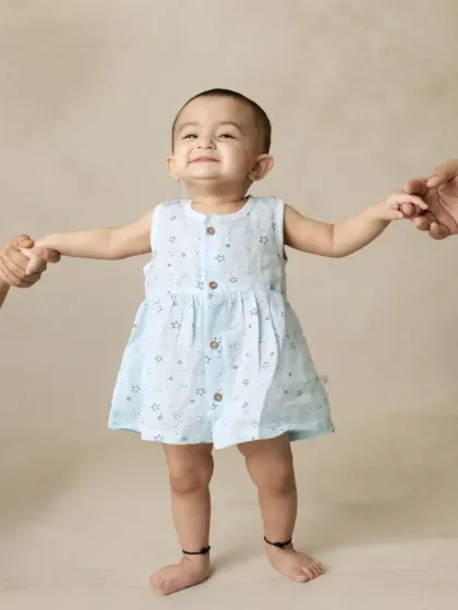 A collection of simple, classic portraits of twin babies. Without props or themes, their individual expressions and connection are beautifully highlighted.