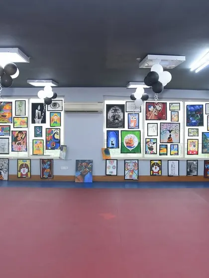 A wide view of our annual Fine Arts Exhibition at the Dhwani Kala Mahotsav. We transform our space into a professional gallery to showcase the amazing work of our students, giving them a real-world platform to display their talent.