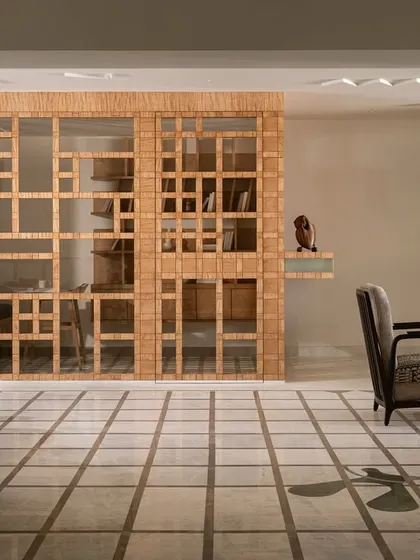 Another view of the foyer, showing the custom console with its pixelated marble detail and the view towards the study.