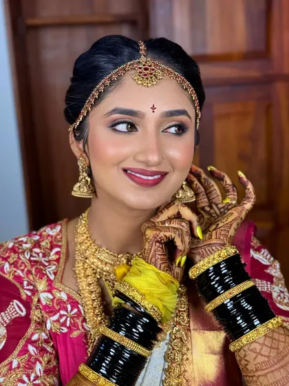 My gorgeous bride Nayana, all set for her Muhurtham. I love creating these beautiful looks, focusing on flawless skin and eyes that sparkle. Her happiness is the best reward.
