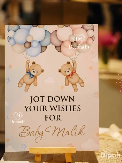 A "Jot Down Your Wishes" station for Baby Malik.