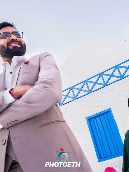 A stylish portrait of Pankaj and Anushree against a clean, architectural background. This shows my ability to create fashionable and modern couple portraits.