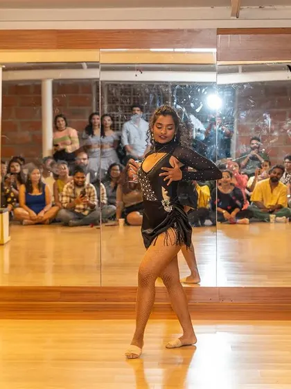 A captivating solo moment during a performance at our Motley Mixer. These events give our dancers a chance to truly express themselves and connect with the audience.