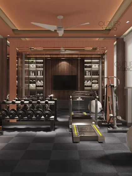 A wider view of the private home gym, showing the full range of equipment and the mirrored walls that make the space feel larger and more energetic.