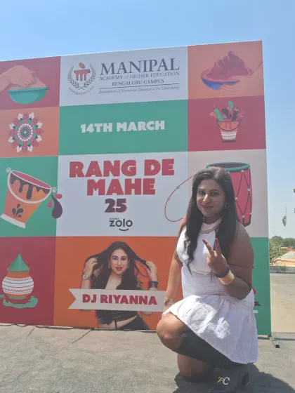 Posing in front of the official event banner for Rang De Mahe '25 at Manipal University's Bengaluru Campus. It was an honor to be the featured DJ for their celebration.