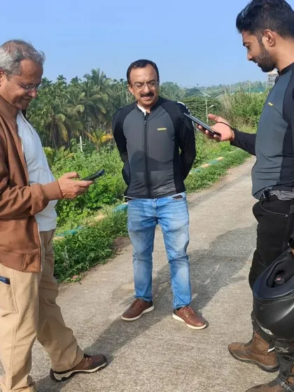 Even when we stop, the conversation often revolves around bikes and gear. Here we are checking out some riding gadgets.