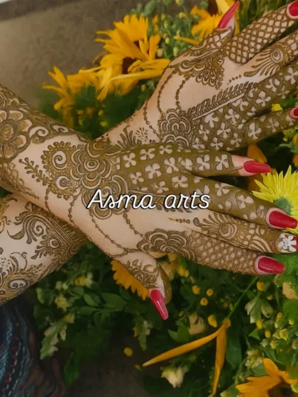 This design has a more open, flowing feel, with floral vines wrapping around the hands and arms. The negative space makes the patterns stand out beautifully. It's a modern take on traditional bridal henna.