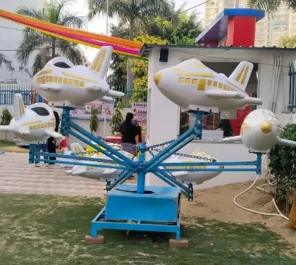 This aeroplane carousel ride is a delight for children at any outdoor event or birthday party. It's a colorful and gentle ride that keeps the young guests happily entertained.