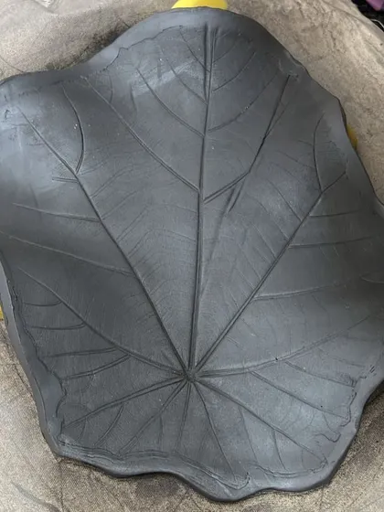 From forest floor to ceramic form. I found a large, beautiful leaf while traveling and carried it back to the studio to impress its form and memory into this clay platter.