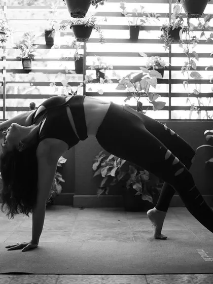 Muscle cramps during yoga can happen for many reasons, from dehydration to muscle fatigue. This is Camatkarasana, or Wild Thing pose, and it reminds us to stay hydrated, listen to our bodies, and avoid locking our joints to prevent cramps.