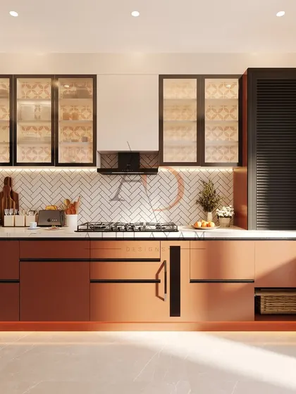 A sleek and sophisticated kitchen in a warm rust tone, featuring a herringbone tile backsplash, handleless lower cabinets, and glass-front upper cabinets.