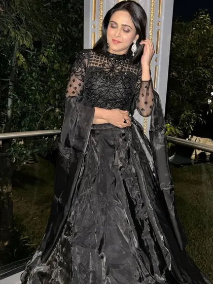 A duplicate of 167, an elegant shot of the black gown.