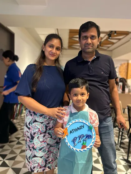 A beautiful family portrait from our Father's Day celebration. They worked together to create a lovely piece of art to take home.