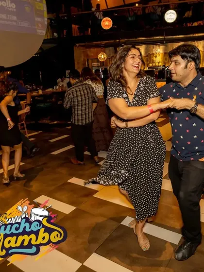 A happy moment between songs. The vibe at Mucho Mambo is always positive and encouraging, making it the perfect midweek or weekend escape.