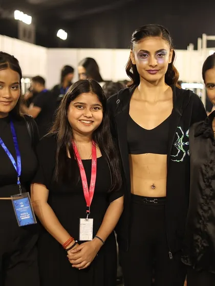 This is your backstage pass to the industry. Our students are seen here with a model at Global India Couture Week, gaining invaluable hands-on experience in a high-pressure, professional fashion environment.