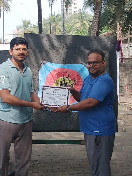 An adult student from the November batch receives his certificate. It's rewarding to see students of all ages achieve their goals.
