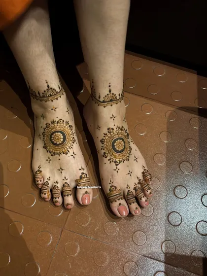 Another view of the simple mandala foot design, showing its clean lines and symmetrical beauty.