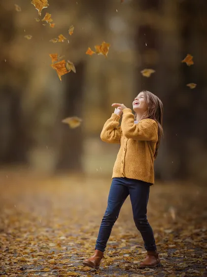 The pure joy of a child playing in the falling autumn leaves. Capturing kids in their own little world, completely lost in the moment, is what makes these sessions so special.