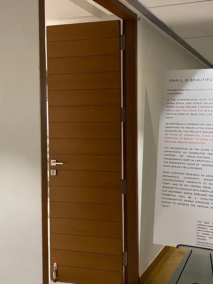 The entrance to the Saanchi Gallery, where the exhibition was held. Clear signage and a welcoming entryway are crucial elements in guiding the visitor's experience from the very first moment.