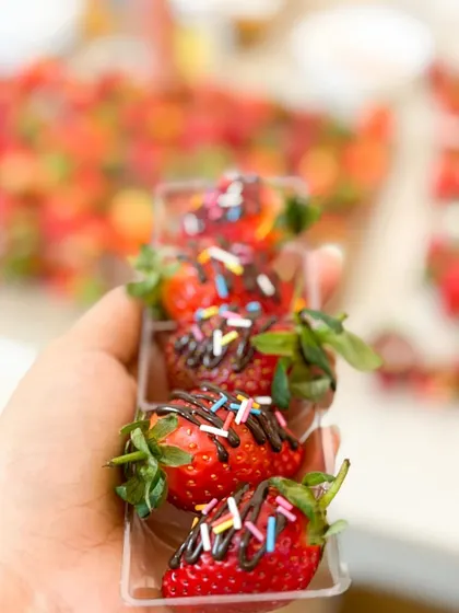 Looking for a unique birthday favour? These boxes of fresh, farm-sourced strawberries drizzled with chocolate and sprinkles are always a huge hit with guests of all ages.