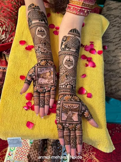 A beautiful bridal design featuring a 'varmala' (garland exchange) ceremony on one palm and a 'diya' (lamp) on the other. The arms are decorated with elephant and palace motifs.