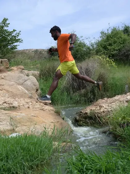 New month, same mission. An action shot of me leaping over a stream during a trail run. This is what running in nature is all about.