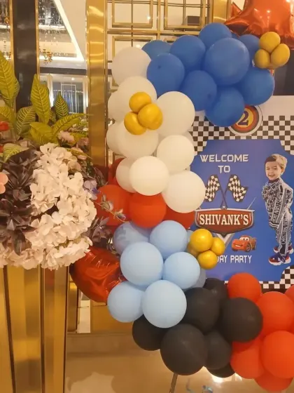 A custom welcome sign for the Cars-themed party, complete with a photo of the birthday boy.