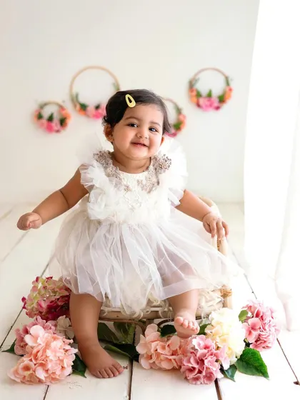 The little wiggle and happy expression make this shot so full of life. Toddler sessions are all about capturing their energy and joy.