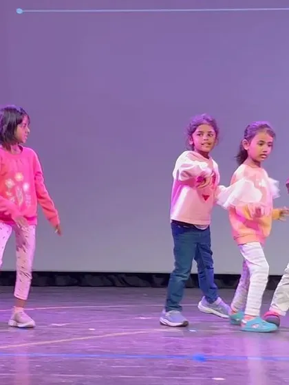 Another angle of our students practicing their dance routine, showcasing their impressive coordination and teamwork.