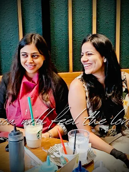 "You will feel the love." Two friends sharing a laugh over coffee and canvases. This is the warm, joyful vibe of our workshops.