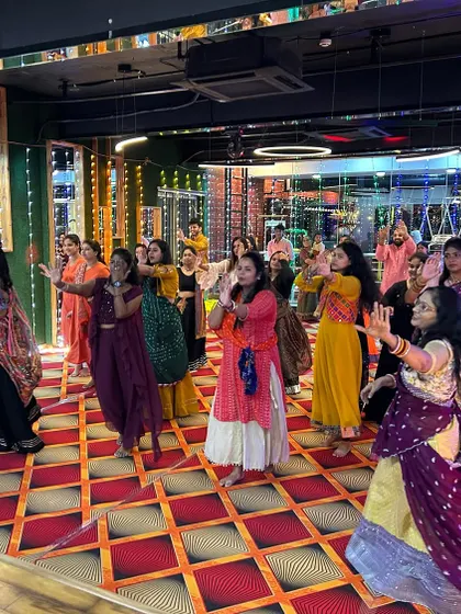 A candid moment from a group Garba dance. My choreography focuses on simple, repetitive steps that look great when performed in a large group.