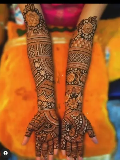 A beautiful floral design covering the full arms. This is a great option for a bride who prefers floral patterns over figurative work.