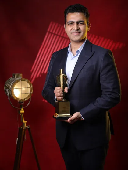 Our director, holding the Exhibition Excellence Award. This award reflects the passion, precision, and purpose we bring to every plate and every event.