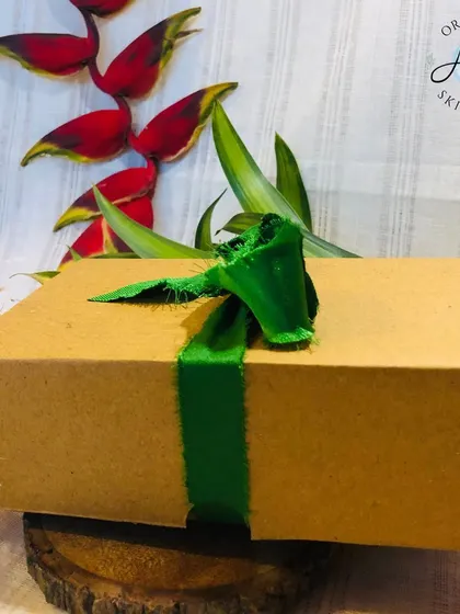 Every gift box is wrapped with care. This 'Rustic Rakhi Gift Box' is tied with a beautiful green ribbon, ready to be sent to your loved one. The packaging is completely plastic-free and recyclable.