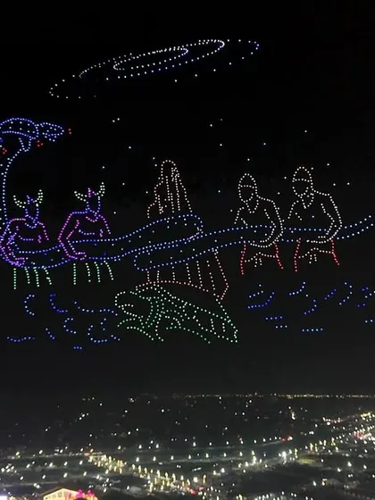 A depiction of the Samudra Manthan from our Maha Kumbh drone show, showing deities and asuras churning the cosmic ocean. This complex narrative was retold using thousands of points of light.