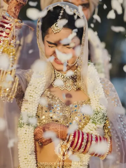 A beautiful video capturing the essence of a minimalist wedding. The decor focused on a clean palette of whites and greens, with soft, ambient lighting creating a romantic and deeply personal atmosphere.