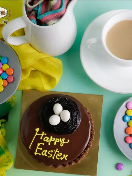 Our mini chocolate truffle cake for Easter features a cute bird's nest design. It's a rich, decadent, and festive dessert perfect for your holiday table.