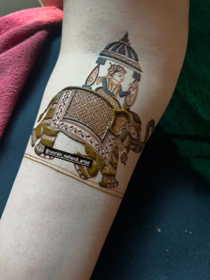 A close-up of a completed royal elephant figure. In my class, you'll learn the shading and filling techniques needed to create such detailed and impressive motifs for your bridal clients.