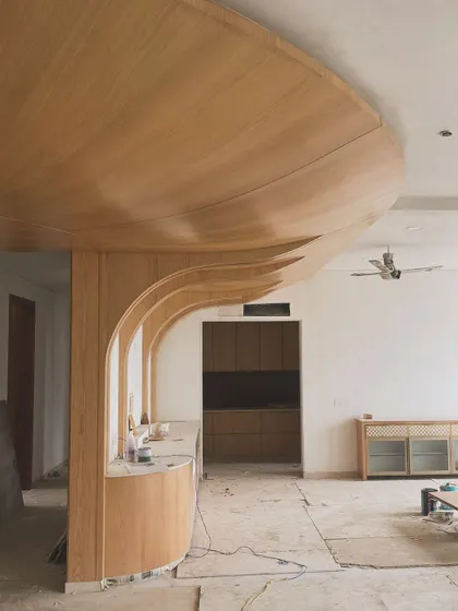 The complex carpentry work for a curved wooden ceiling and arched partitions under construction. These organic forms are challenging to execute but create a wonderfully soft and flowing interior space.